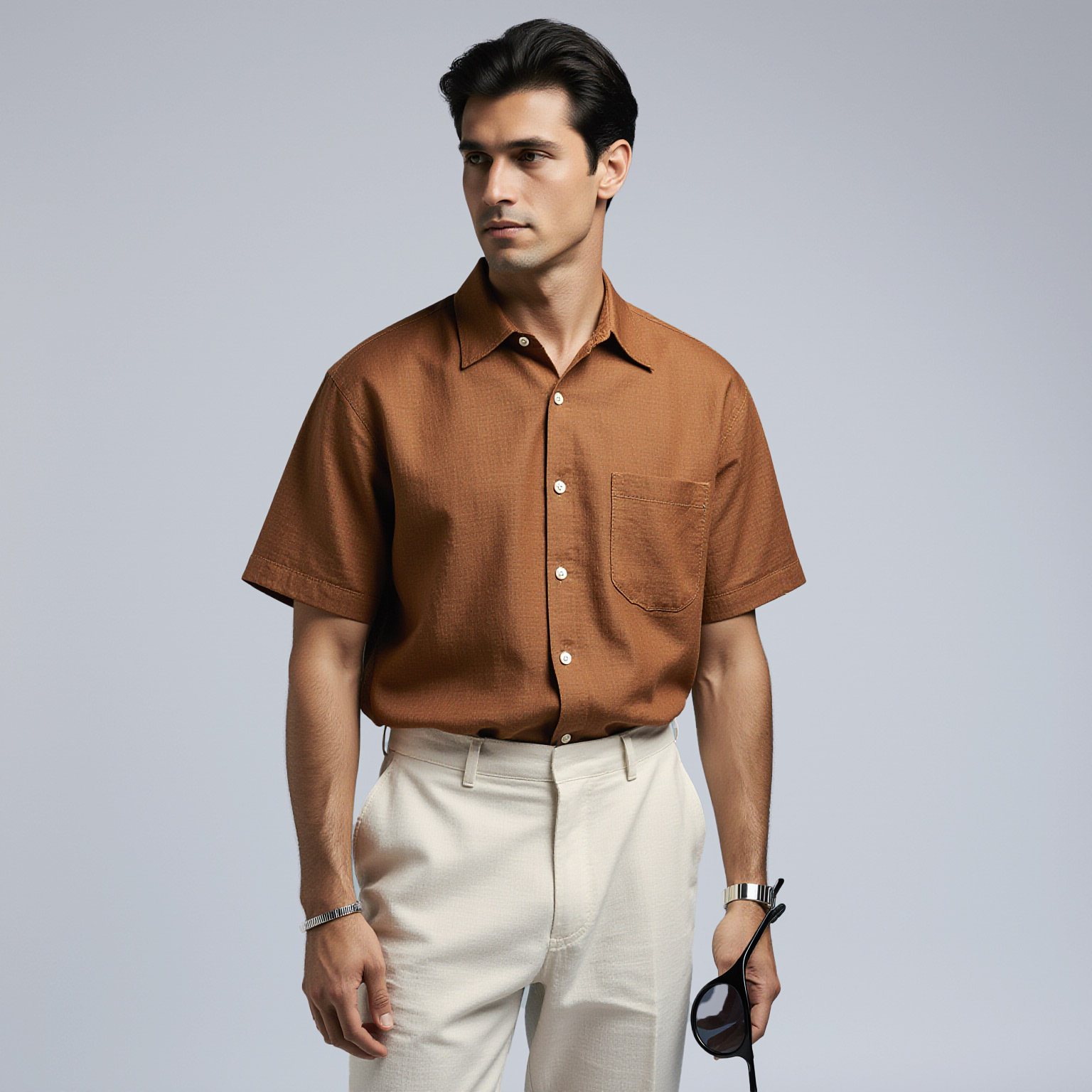 Men’s short-sleeve button-down shirt professionally cleaned by Sudsies dry cleaning near Fisher Island