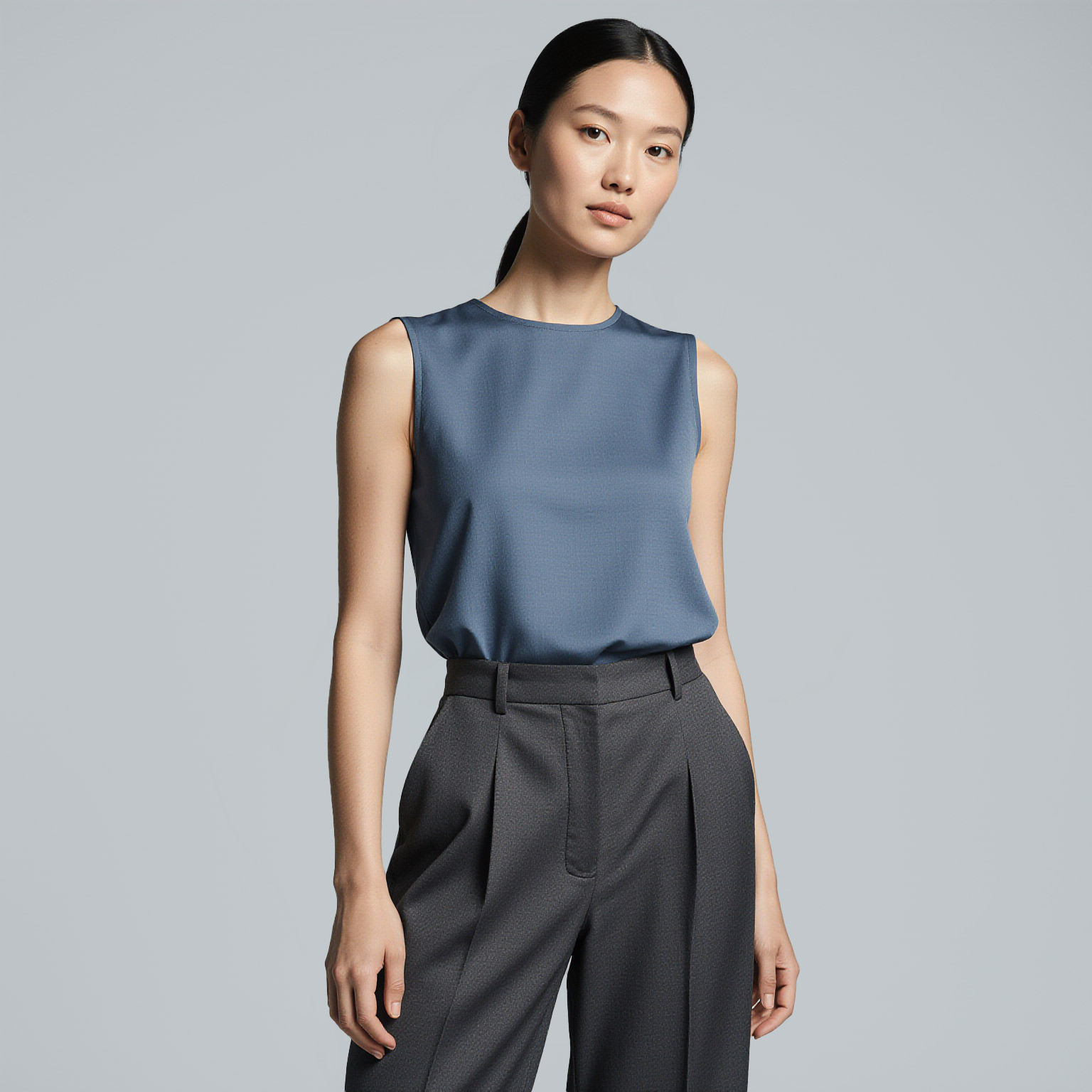 Sleeveless blouse professionally cleaned by Sudsies dry cleaning in Coral Gables